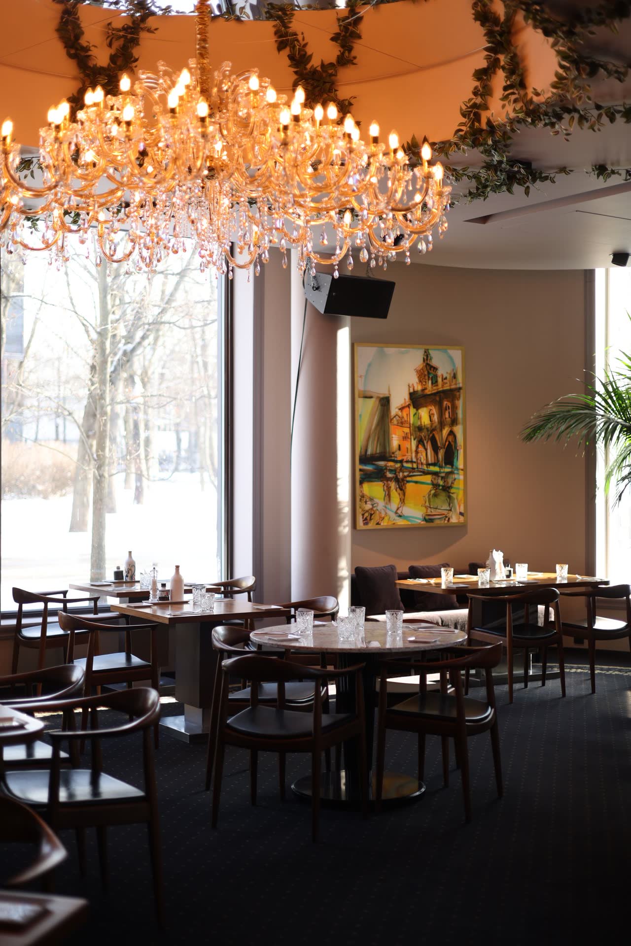 The dining room under chandeliers